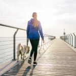 An older adult enjoying a brisk walk outdoors, symbolizing active aging and cognitive health.
