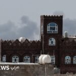 صورة لدخان يتصاعد من مطار صنعاء الدولي بعد غارات جوية