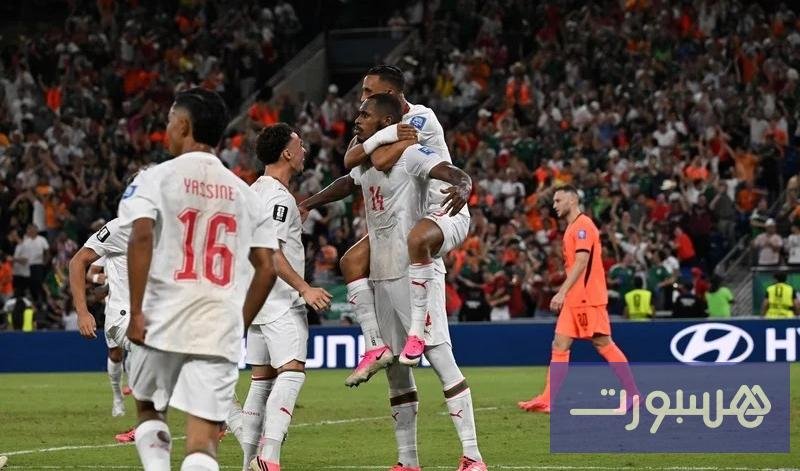 صورة للاعبي المنتخب المغربي وهم يستحوذون على الكرة في مباراة بكأس العالم 2026