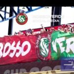 شعار فصيل روسوفيردي وبجانبه صورة للاعبي المنتخب المغربي