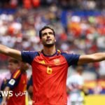 لاعب منتخب إسبانيا ميكل ميرينو يحتفل بهدفه الحاسم في مرمى بلجيكا