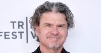 Author Dave Eggers attends 'The Turning Point: To Be Destroyed' premiere, captured in a professional headshot.