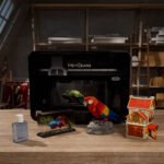 HeyGears G1X desktop full-color 3D and UV printer showcasing a vibrant, multi-textured 3D printed object.