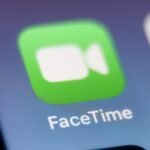 FaceTime Fraud Alert: Scammers Impersonate Apple Support, Empty Bank Accounts 6 Illustration of a person receiving a suspicious FaceTime call from 'Apple Support' with a warning icon.