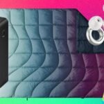 Festival Survival: Essential Gear Proven at Lost Lands & Electric Forest 3 A collection of essential festival gear, including electrolytes, a power bank, and earplugs, laid out for a music festival.
