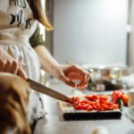 Woman experiencing abdominal discomfort after eating, illustrating gastroparesis symptoms