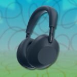 A collection of various headphones and earbuds on sale, showcasing different brands and styles.
