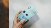 Kodak EC35 35mm film camera in multiple colors with a roll of film