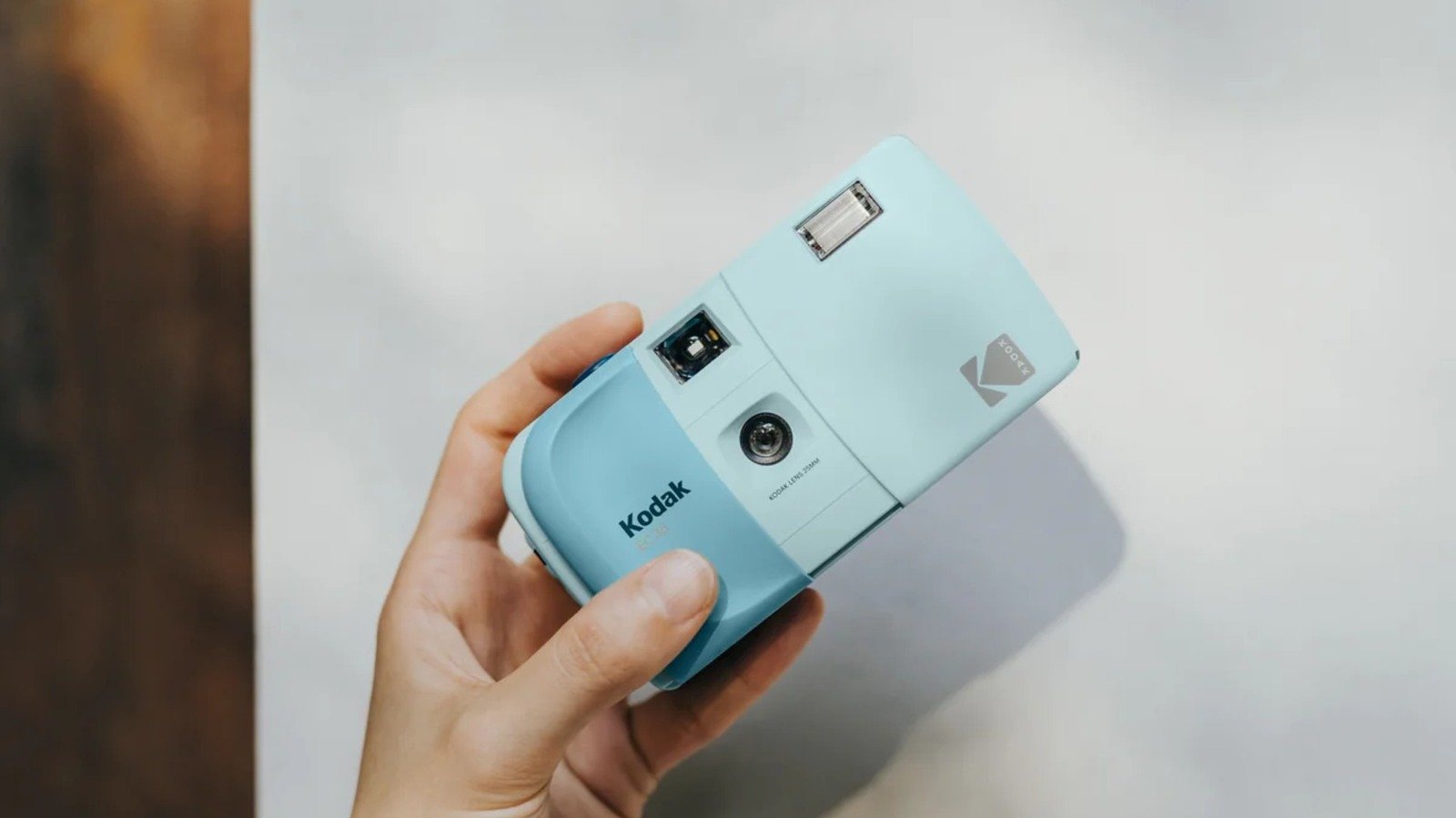 Kodak EC35: The $35 Film Camera Making Analog Photography Accessible 3 Kodak EC35 35mm film camera in multiple colors with a roll of film