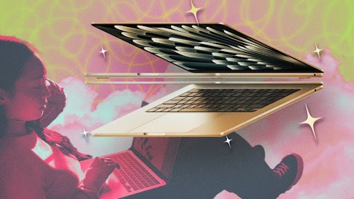 A sleek MacBook Air open on a desk, surrounded by an external SSD, a fast charger, and a coffee cup, symbolizing productivity.