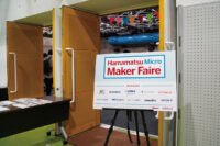 A vibrant display of innovative maker projects at Maker Faire Hamamatsu, showcasing the city's blend of music and technology.