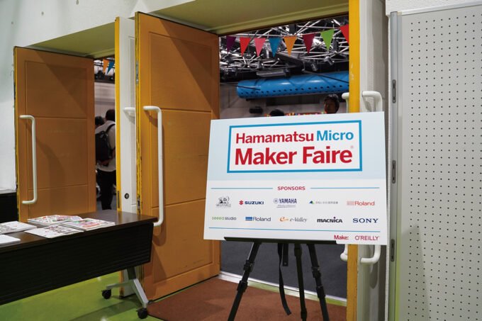 A vibrant display of innovative maker projects at Maker Faire Hamamatsu, showcasing the city's blend of music and technology.