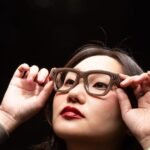 A close-up photo of Meta smart glasses, possibly showing the lens or frame detail.