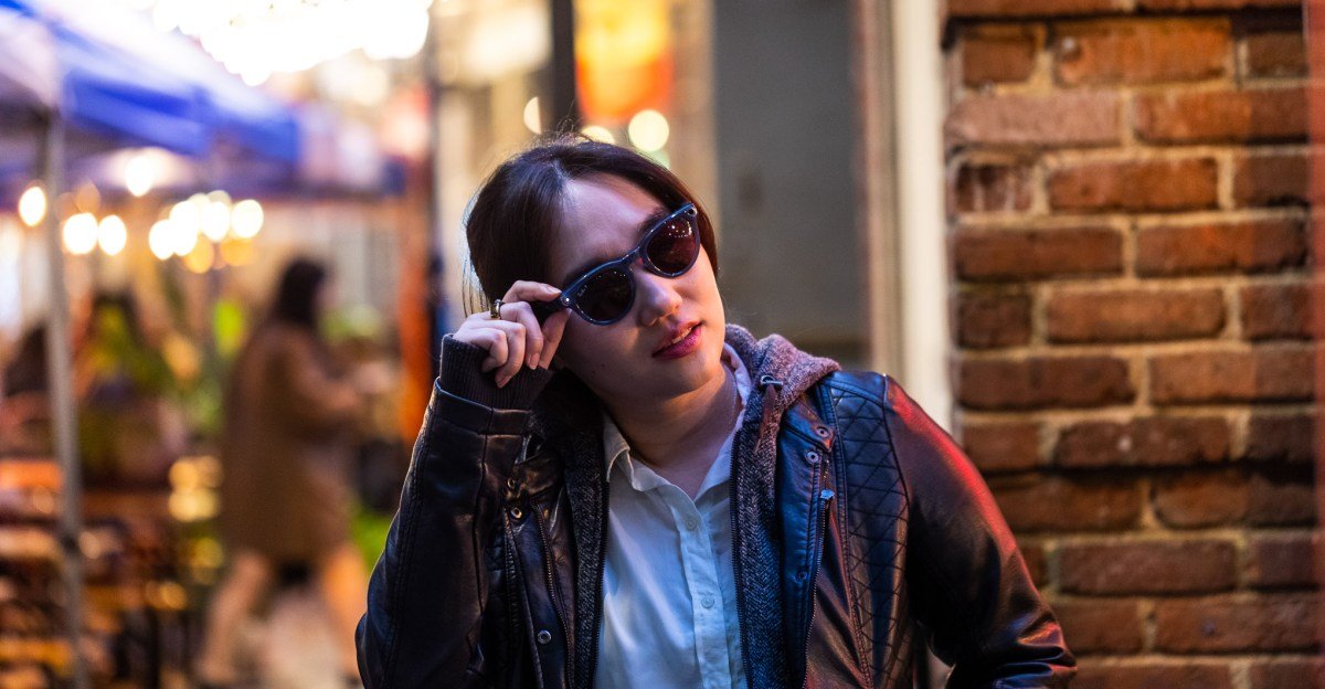 A close-up photo of Meta smart glasses, with the privacy LED light subtly illuminated, highlighting its often-overlooked presence.