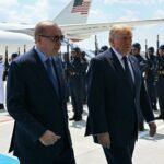 U.S. President Donald Trump is greeted by Turkish President Recep Tayyip Erdogan upon arrival at Etimesgut Air Base for the NATO summit in Ankara.