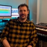 Oli Freke, synth historian and author of Beat Gems, with a drum machine or bicycle