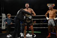 Omar Sellami, ancien champion de boxe franco-marocain, transmettant son savoir-faire et les valeurs de la boxe à Montbéliard et au Maroc via l'Empire Fight Morocco.