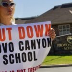 Utah Revokes License of Provo Canyon School Following Paris Hilton's Abuse Allegations 8 Paris Hilton speaking out against the troubled teen industry, with Provo Canyon School in the background.