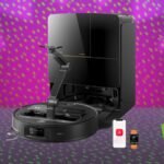 Roborock Saros Z70: The AI-Powered Robot Vacuum with a Robotic Arm Slashes Price by 50% 8 Roborock Saros Z70 robot vacuum and mop with its robotic arm extended, cleaning a floor.