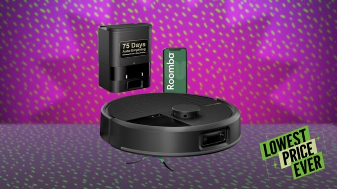 iRobot Roomba Max 705 robot vacuum cleaning a floor with its auto-emptying dock in the background