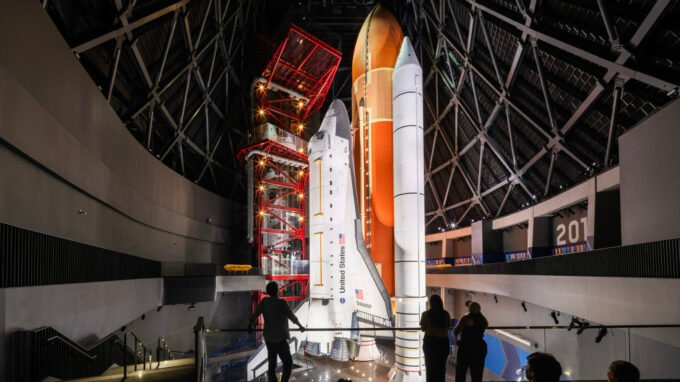 Witness History: Space Shuttle Endeavour's Grand New Exhibit Unveiled 9 Space Shuttle Endeavour displayed vertically in launch position with solid rocket boosters and external tank at the California Science Center.