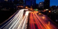 Cars on a highway, with a speedometer highlighting the minimal time saved versus fuel consumed by speeding.