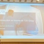 Vue d'ensemble du siège social de T2S Group Holding ou d'un graphique boursier symbolisant l'introduction en bourse.