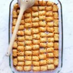 The Ultimate Tater Tot Casserole: A Crowd-Pleasing Comfort Food Classic 6 Golden brown Tater Tot Casserole bubbling hot, topped with fresh chives