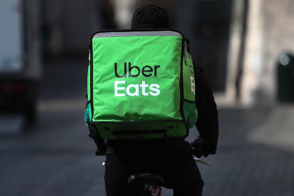 Uber logo displayed on a smartphone screen, symbolizing its European operations.
