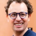 Anthropic Targets Record $2 Trillion IPO as AI Reshapes Global Markets and 'Compute' Becomes New Commodity 6 Conceptual image of AI technology and stock market graphs, representing Anthropic's potential $2 trillion IPO.