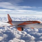 Le fonds américain Apollo acquiert EasyJet pour 6,7 milliards d'euros, remportant une bataille acharnée. Découvrez les enjeux de cette transaction majeure dans le ciel européen.