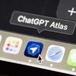 A stylized representation of a browser icon with a broken or crossed-out AI symbol, signifying the shutdown of ChatGPT Atlas.