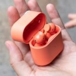 CMF Clip Pro open-ear earbuds with charging case, highlighting their comfortable, secure design.