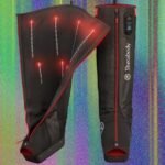A person's legs wearing modern compression boots, illustrating advanced muscle recovery technology.