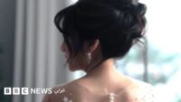 صورة لوانغ تشوانغ مع زوجته السابقة في يوم زفافهما، تظهر جانباً من عمليات الاحتيال الزوجي في الصين.