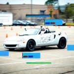 A DIY recording race car tire pyrometer with an ESP32 microcontroller and a K-type probe, measuring tire temperatures on a race car tire.