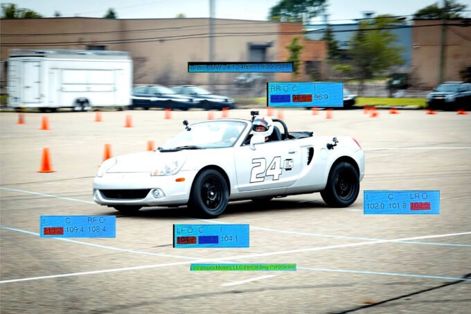 A DIY recording race car tire pyrometer with an ESP32 microcontroller and a K-type probe, measuring tire temperatures on a race car tire.