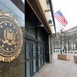 An FBI badge next to a cryptocurrency coin, symbolizing the alleged theft of digital assets by a federal agent.