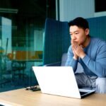A founder transitioning into a CEO role, symbolized by a growing company chart and a leader delegating tasks.