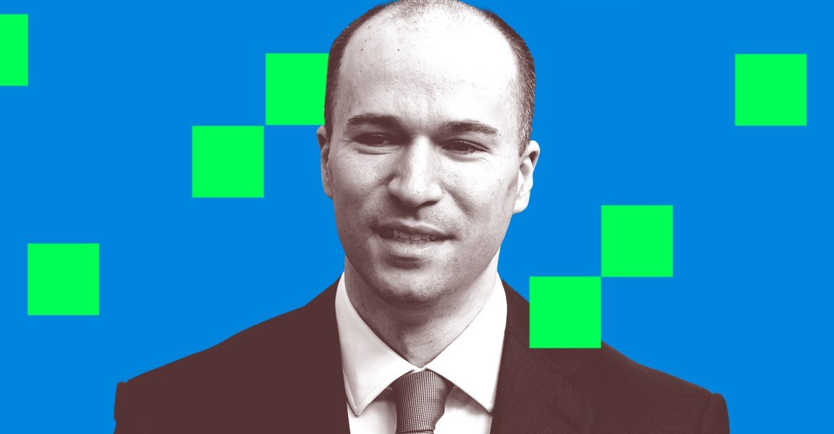 Greg Brockman, President and Co-founder of OpenAI, at a tech event, symbolizing his increasing influence.