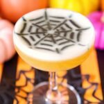 A collection of various Halloween-themed cocktails with spooky garnishes and decorations, set against a dark, festive background.