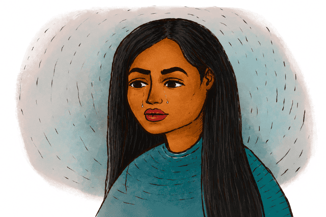 A person looking thoughtfully into the distance, with a faint blue or grey filter over the scene, symbolizing underlying sadness affecting perception.