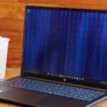HP OmniBook 3 16-inch laptop open on a desk, showcasing its screen and keyboard