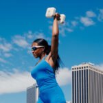 An active woman stretching, symbolizing safe exercise during fertility treatment.
