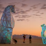 Jen Lewin's 'The Ursas' sculptures, Ursa Major and Ursa Minor, installed along the Gowanus Canal in Brooklyn, featuring reflective surfaces and LED lighting.