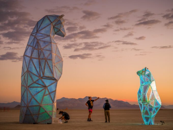 Jen Lewin's 'The Ursas' sculptures, Ursa Major and Ursa Minor, installed along the Gowanus Canal in Brooklyn, featuring reflective surfaces and LED lighting.