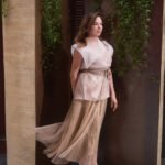 Portrait of Lauren Rottet, a renowned architect and interior designer, surrounded by her elegant designs.