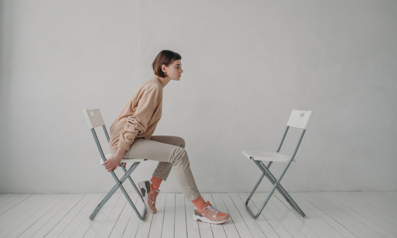 An elderly person looking thoughtful or isolated, symbolizing loneliness and its impact on aging.