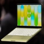 A sleek MacBook Neo laptop displayed on a desk, highlighting its design and the Apple logo, representing an affordable tech deal.