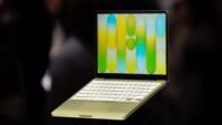 A sleek MacBook Neo laptop displayed on a desk, highlighting its design and the Apple logo, representing an affordable tech deal.